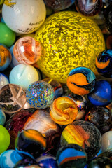 A colorful collection of marbles in various patterns and colors.