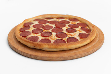 Pizza with salami  mushrooms and cheese on a white background
