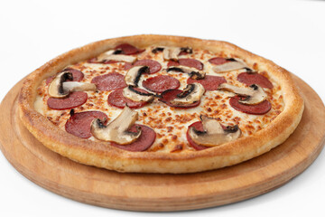 Pizza with salami  mushrooms and cheese on a white background