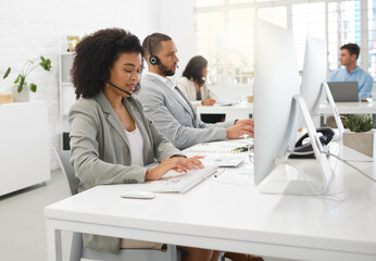 Advisor, woman or typing in call center for consulting, online help or loan advice on computer....