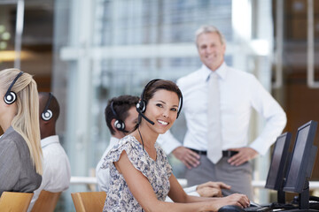 Call center, coworking and portrait of woman in customer support, lead generation and friendly service. Sales agent, office team and tech in agency for telemarketing business, communication and smile