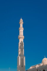 Obraz premium Photograph of El Mina Masjid mosque in Hurghada. Exterior of the Muslim mosque where Islam is practiced. Religion. Egypt