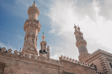 Photograph of the Al-Azhar mosque in Cairo. Exterior of the Muslim mosque where Islam is practiced. Religion.
