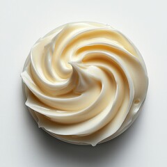 Close-up of smooth vanilla swirl on white background: creamy dessert art focus