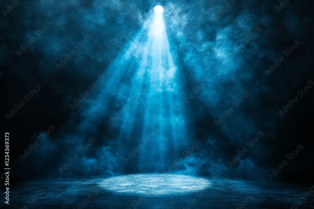 Poster dramatic blue lighting and fog create an atmospheric stage setting for a theatrical performance