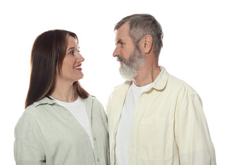 Happy daughter and her father looking at each other on white background