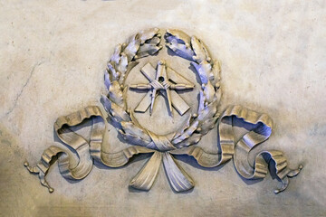 relief vignette with bay leaf from marble on the surface