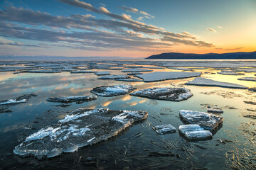 Fototapeta premium ice drift on Lake Baikal at the source of the Angara River in spring