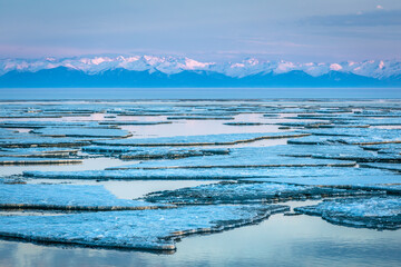 ice drift on Lake Baikal at the source of the Angara River in spring