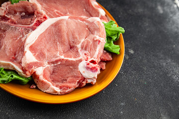 Pork on bones raw meat fresh tasty food dish delicious gourmet food background on the table rustic food top view copy space