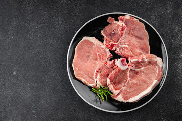 Pork on bones raw meat fresh tasty food dish delicious gourmet food background on the table rustic food top view copy space