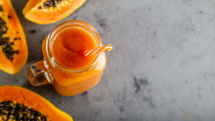 Papaya smoothie, selective focus. Detox, diet food.