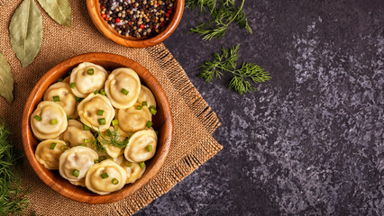Homemade meat dumplings - russian pelmeni.