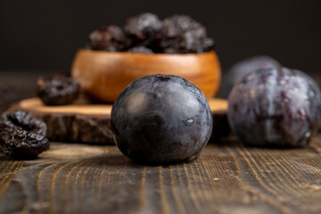 ripe purple plums and dried plums