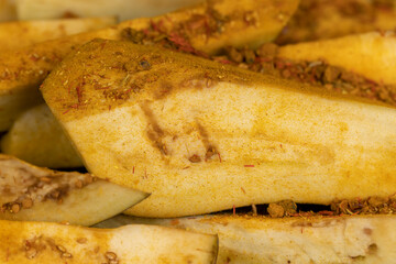 the flesh and seeds of sliced ripe eggplant