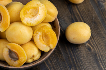 ripe soft apricot fruits on the cutting board