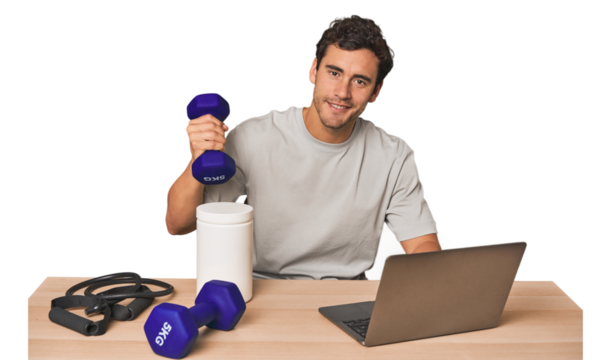 Hispanic male trainer with laptop planning workouts