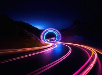 Night road scene with vibrant light trails converging on a glowing circular portal set in a mountain pass.  A mystical and futuristic landscape.