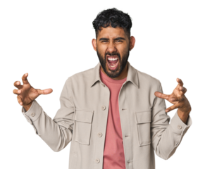 Young Hispanic man isolated screaming with rage.