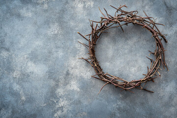 Fototapeta premium Rustic Thorn Wreath with Red Berries on Gray Textured Background
