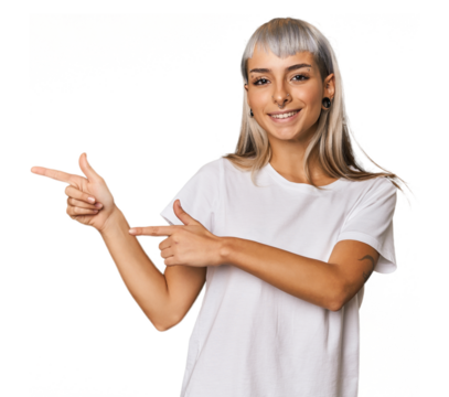 Young caucasian young woman in studio excited pointing with forefingers away.