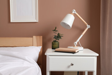 Stylish interior in mocha mousse shade. Curtain and wall in trendy color of 2025 year