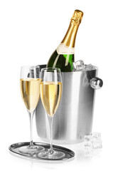 Champagne and bucket with ice isolated on white