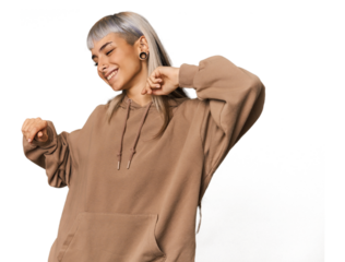 Young caucasian young woman in studio dancing and having fun.