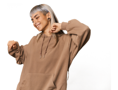 Young caucasian young woman in studio dancing and having fun.