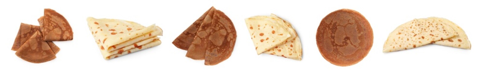 Different tasty crepes on white background, set
