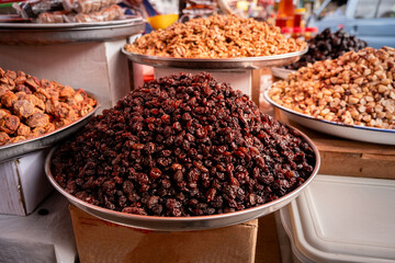 raisins for sale in a street market in latin america - food concept