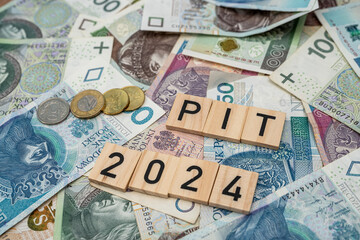 Wooden cubes pit Year 2024 2025, polish taxation day Income tax settlement