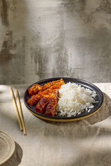 fried chicken in garlic sauce with rice