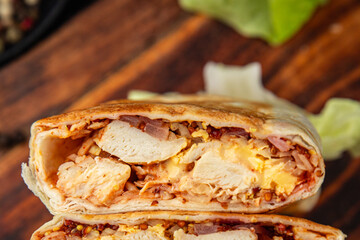 donner kebab chicken and vegetables shawarma sandwich tortilla meat filling fast food flatbread fresh tasty food dish gourmet food background on the table rustic food top view copy space
