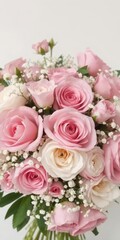 Obraz premium Elegant pink and white floral arrangement with roses, peonies, and baby's breath, spring, natural