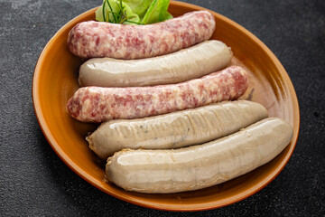 raw sausages pork, beef, chicken, lamb fresh tasty food dish gourmet food background on the table rustic food top view copy space