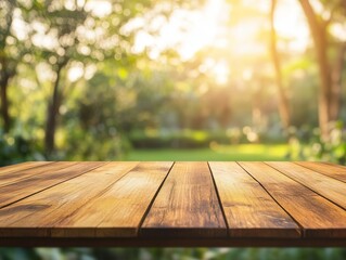 Empty wooden table against blurred sunny park background.
