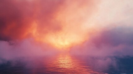 Dramatic pink clouds above calm water reflecting sunset colors, with a foggy haze