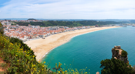Aerial view to Nazare, Portugal and surrounding areas with stunning seascape of Atlantic ocean