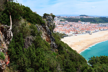 Aerial view to Nazare, Portugal and surrounding areas with stunning seascape of Atlantic ocean