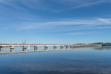 The Tay Road bridge reflected in the River Tay, Dundee, Angus, Scotland
