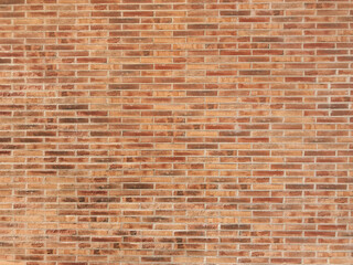 Brick wall with a red brick pattern