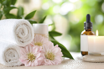 Soft towels, flowers, and essential oils create serene spa atmosphere