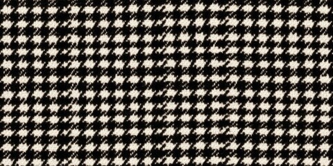 Black and White Houndstooth Pattern: A detailed close-up shot reveals the intricate texture and geometric elegance of a classic black and white houndstooth pattern.