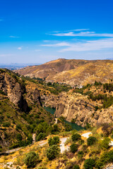 Obraz premium Genil River Behind Canales Reservoir in the Sierra Nevada Foothills, Granada, Spain