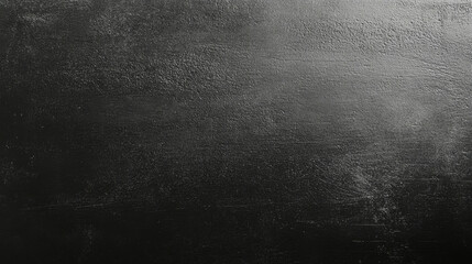 Dynamic minimalist black gradient background with fine film grain for creative projects