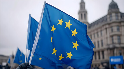 EU flags waved at London protest; city background, political demonstration