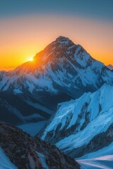 Fototapeta premium Majestic sunset over towering snow-capped mountain peaks in the Himalayas