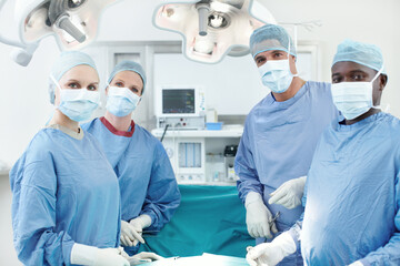 Surgery, hospital and doctors portrait in operating room for patient, emergency or operation. Healthcare people, collaboration and specialist with surgical equipment, teamwork and clinic service