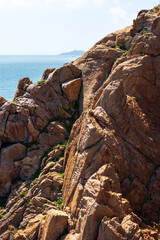 Majestic Rocky Coastline Overlooking the Tranquil Ocean